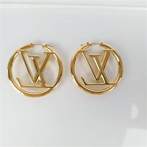 louis vuitton hoop earring|louis vuitton symbol earrings.